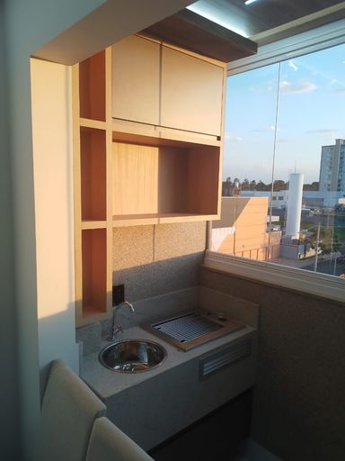 Varanda Gourmet com churrasqueira a gás.