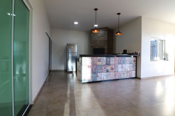 Varanda Gourmet com churrasqueira e fogão a lenha  - Casa venda no Jardim Canadá/ Lancaster