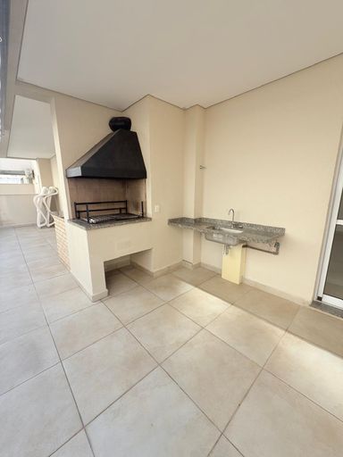 Salão de festas com forno de pizza e churrasqueira