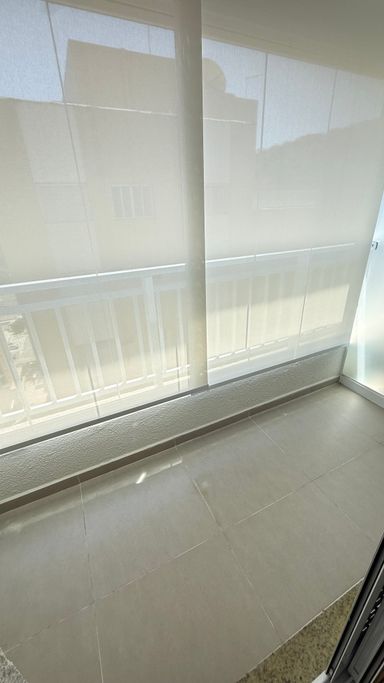 Varanda fechada com vidro da suite 1