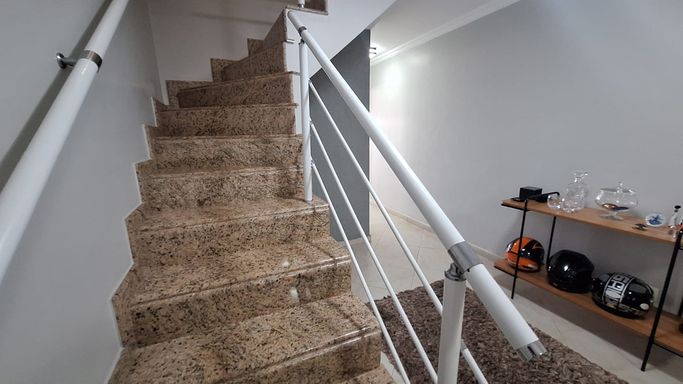 escadas acesso aos dormitórios.