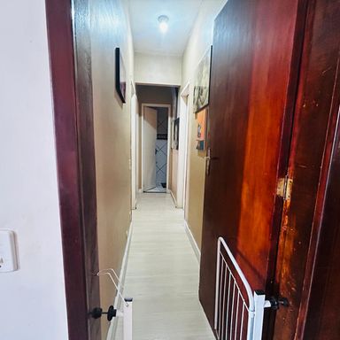 Corredor de acesso aos quartos e banheiros