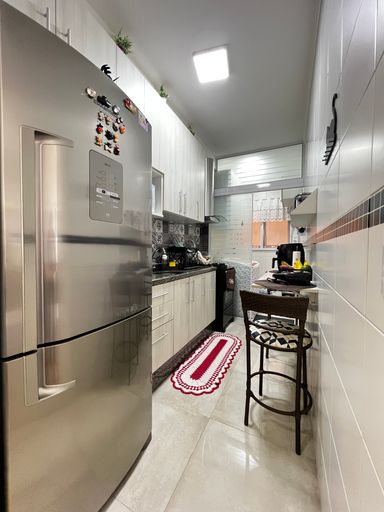 Cozinha do apartamento do Edifício Moutonnée Residence