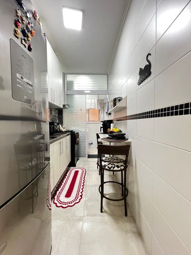 Cozinha do apartamento do Edifício Moutonnée Residence