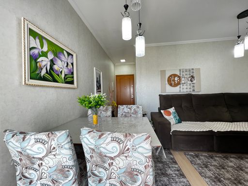 Sala do apartamento do Edifício Moutonnée Residence