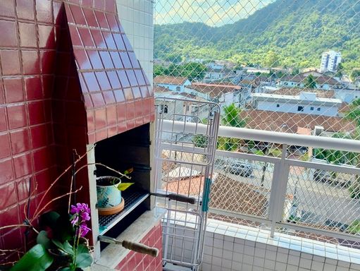 varanda gourmet com churrasqueira a carvão,  vista livre e sol da manhã