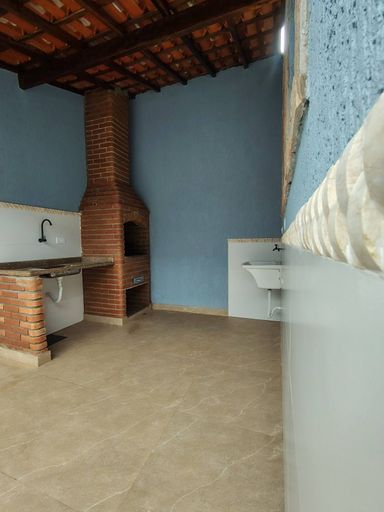 área gourmet com churrasqueira a carvão