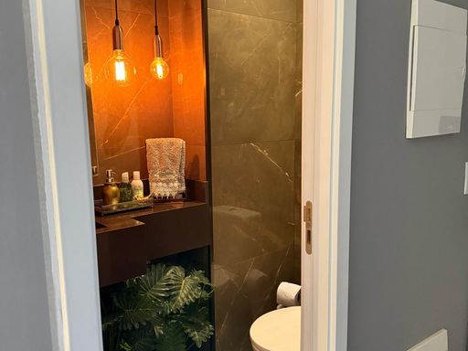 lavabo em total requinte com iluminação impecável