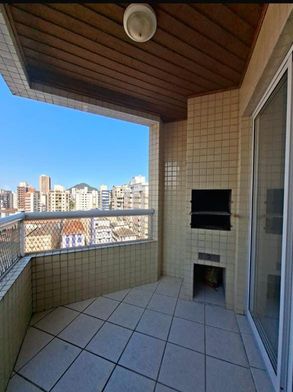 sacada gourmet com churrasqueira a carvão e vista livre