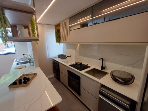 foto do decorado da cozinha semi integrada a área de serviço