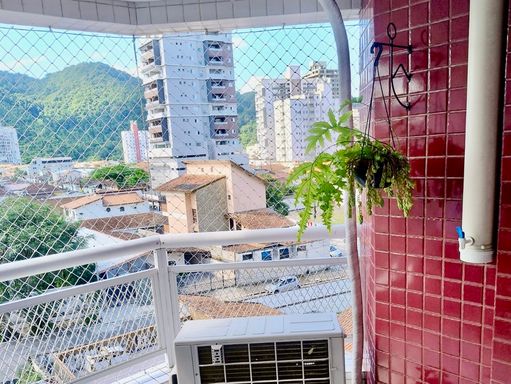 varanda gourmet com churrasqueira a carvão,  vista livre e sol da manhã