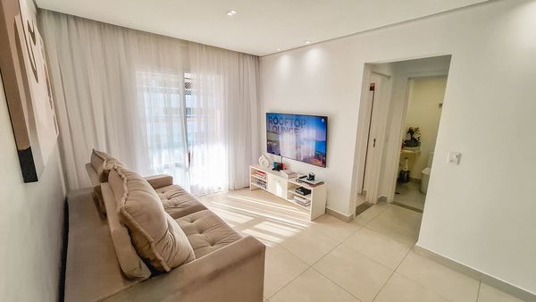 ampla sala 2 ambientes com acesso a varanda gourmet e aos dormitórios