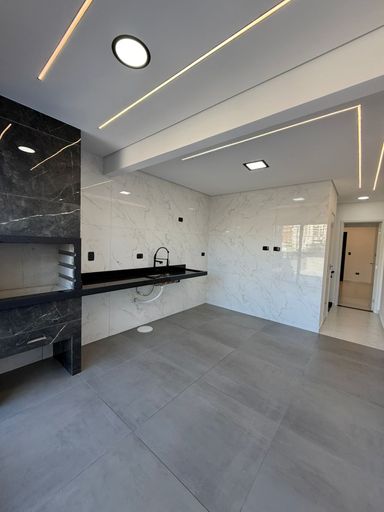 espaço de festas impecável com churrasqueira a carvão