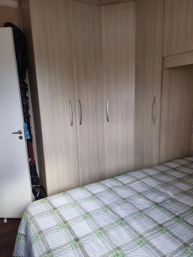 dormitório 1 bem arejado com móveis planejados