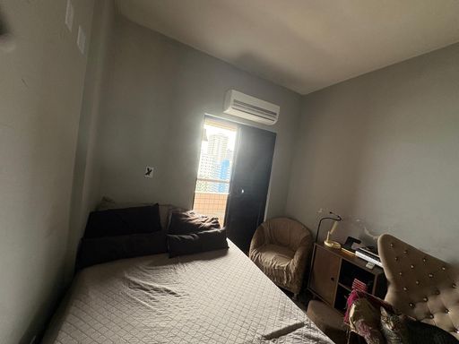 dormitório com ar condicionado e acesso a sacada com vista mar deslumbrante