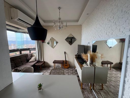 sala ampla com ar condicionado e vista mar privilegiada