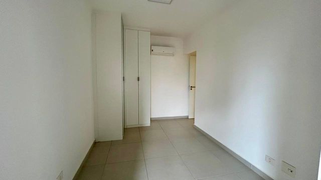 dormitório com ar condicionado