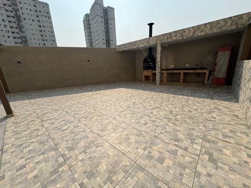 espaço gourmet com churrasqueira a carvão