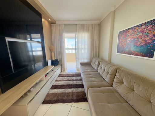 sala integrada com a churrasqueira