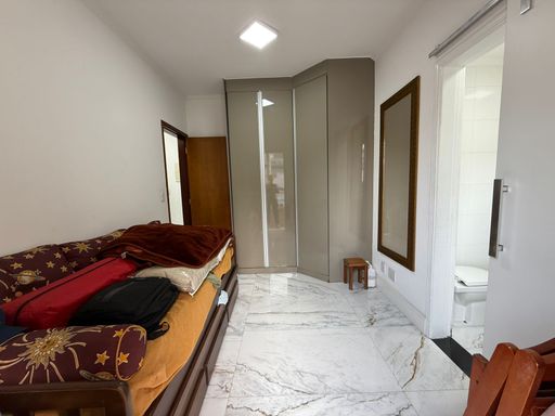 suíte 3 com porta de correr para suíte