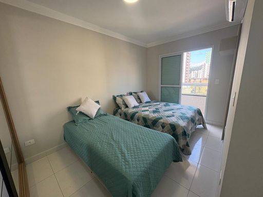 Suíte 2 com armário planejado ar condicionado e acesso a varanda envidraçada