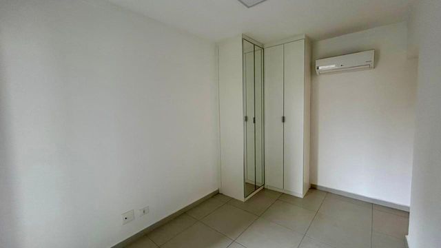 dormitório com ar condicionado