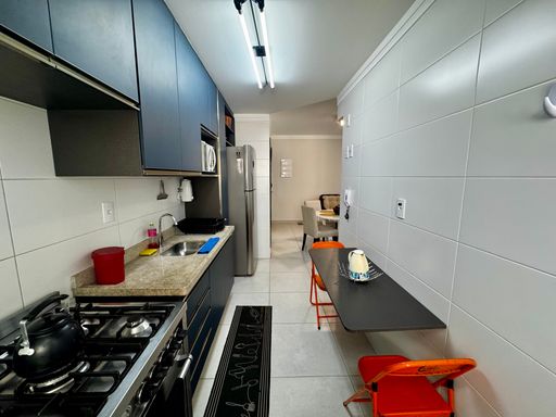 cozinha semi integrada a sala