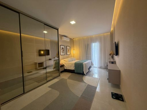 suíte master planejada impecável com banheira, ar condicionado e sacada