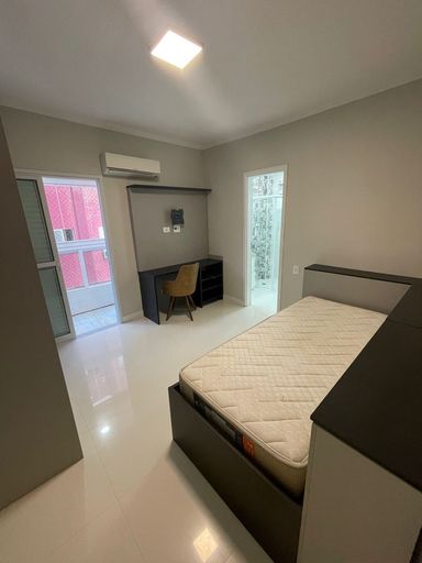 suíte 2 com acesso a varanda gourmet envidraçada