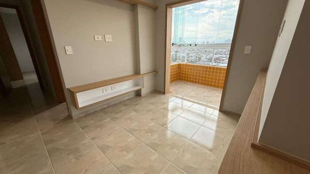 sala 2 ambientes com acesso a varanda gourmet envidraçada