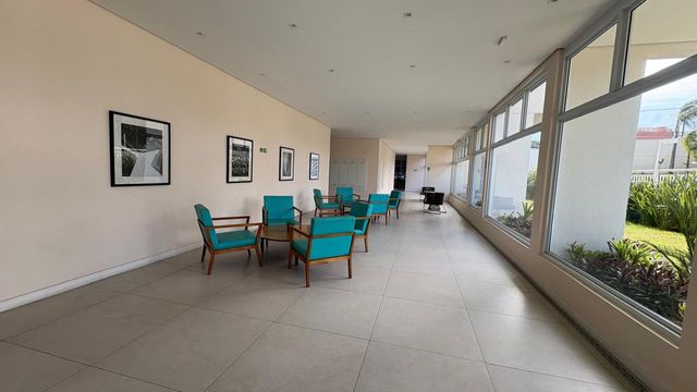 área de convivência com jardinagem impecável