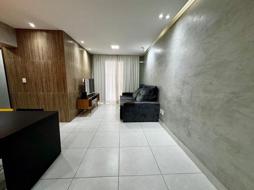 ampla sala 2 ambientes em total requinte, com teto rebaixado, ar condicionado e acesso a varanda gourmet