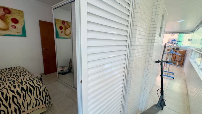 suíte com acesso a varanda