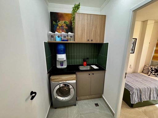 área de serviço com armários planejados