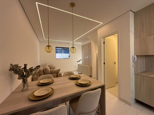sala 2 ambientes em total requinte, sistema de iluminação impecável e com móveis planejados