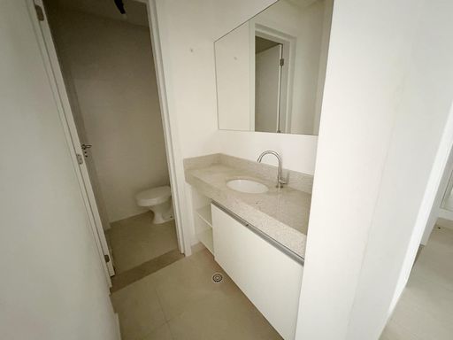 Lavabo clean com armário planejado