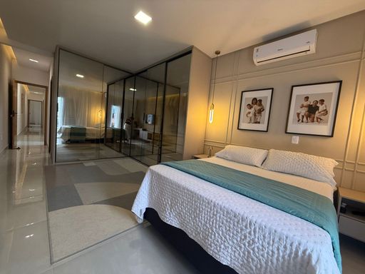 suíte master planejada impecável com banheira, ar condicionado e sacada