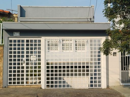 fachada com 2 portões automáticos