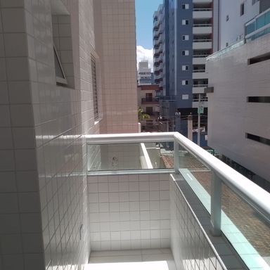 sacada gourmet com porta de correr de vidro