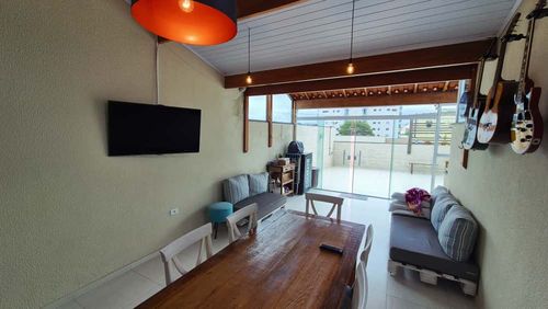 espaço gourmet no piso superior com fechamento em vidro para total privacidade