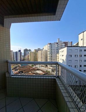 sacada gourmet com churrasqueira a carvão e vista livre