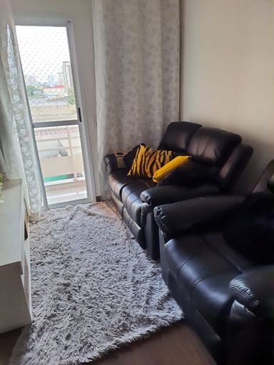 sala com acesso a sacada