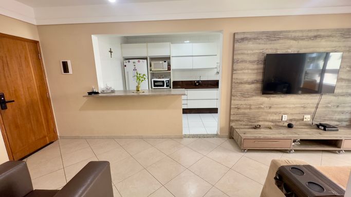 sala integrada com a cozinha