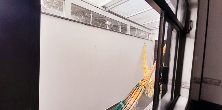 varanda com cobertura envidraçada