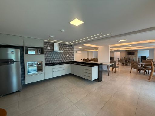 espaço gourmet semi integrado ao salão de festas