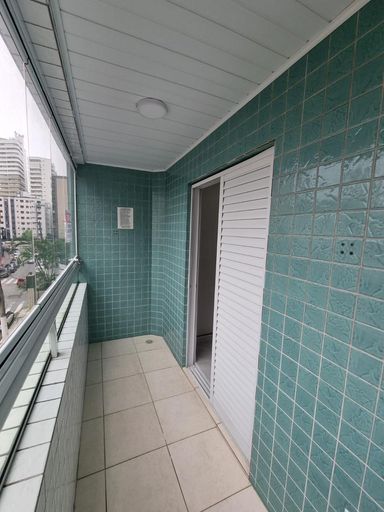 Varanda envidraçada com acesso a suíte