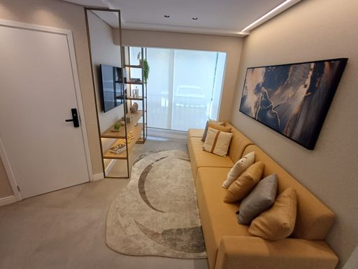 foto do decorado da sala ampla 2 ambientes semi integrada a sacada