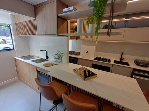 foto do decorado da cozinha semi integrada a área de serviço