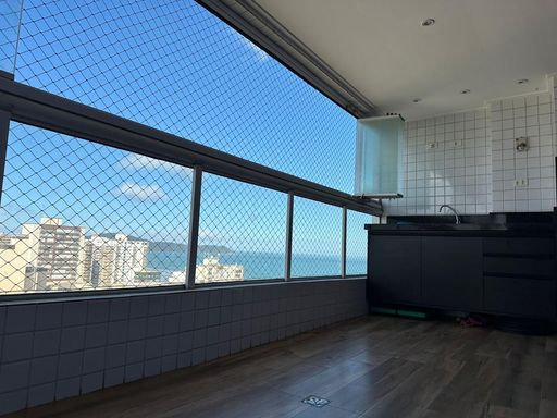 varanda gourmet envidraçada com vista mar livre, andar alto