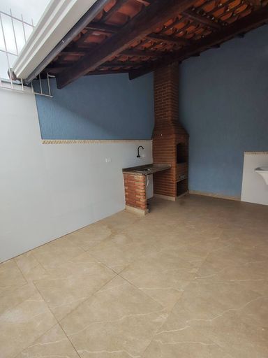 área gourmet com churrasqueira a carvão